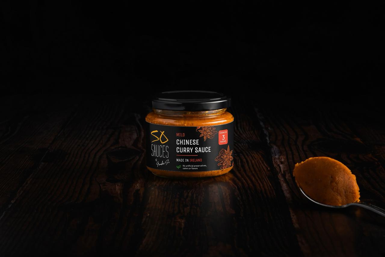 Frankie's Signature Curry Sauce with spoon